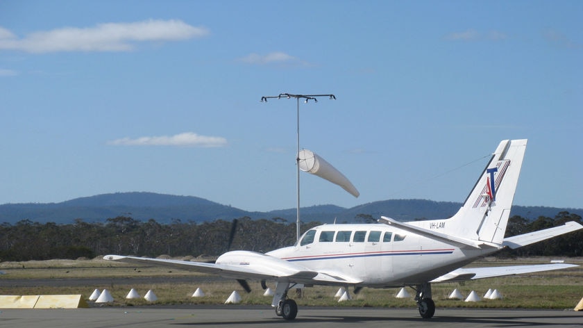 A light plane taxis at Hobart airport.