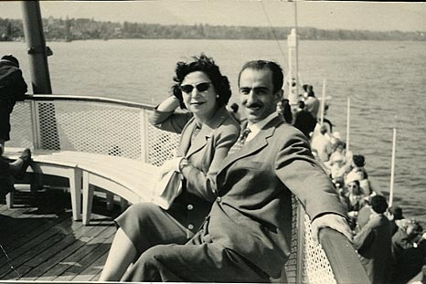 A historic black-and-white image of Russian spy couple Goar and Gevork Vartanyan seated on the deck of a boat.