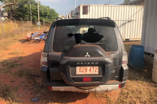 A pajero with a broken window.