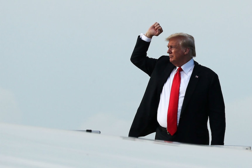 Donald Trump leaves Singapore after Kim Jong-un summit