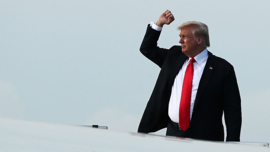 Donald Trump leaves Singapore after Kim Jong-un summit