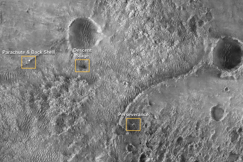 Various components from Perseverance landing picture on the surface of Mars.