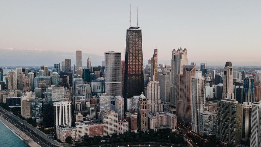 An aerial image of the Chicago skyline, with Oak Beach directly below