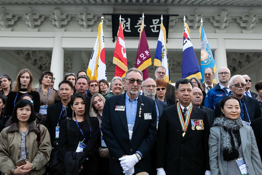 The relatives of UN Command Korean War veterans at the Seoul National Cemetery in November 2018.