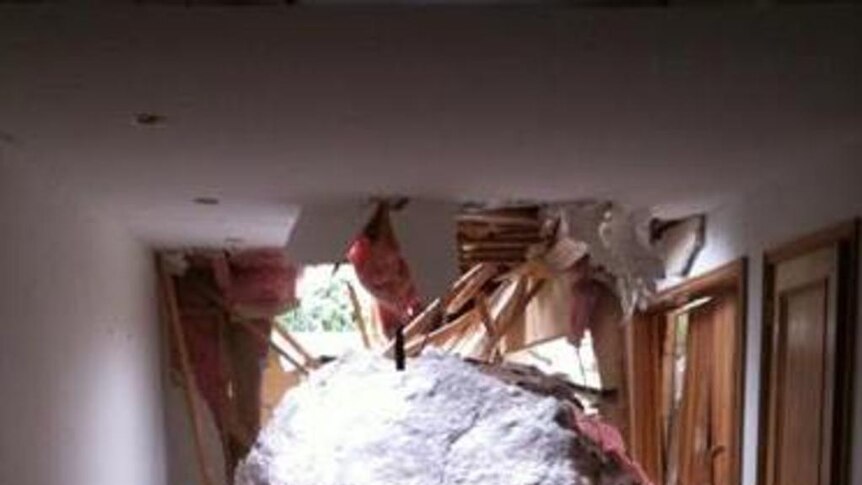Rocky the giant boulder destroyed Phil Johnson's hillside home nine days ago