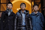 From left, Joshua Wong, Alex Chow and Nathan Law walk out from the Court of Final Appeal in Hong Kong