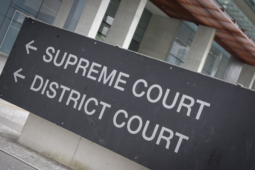 Sign for Brisbane Supreme and District Court buildings.