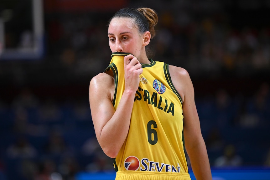 Steph Talbot wipes her face during the Opals' game against Canada at the FIBA World Cup.