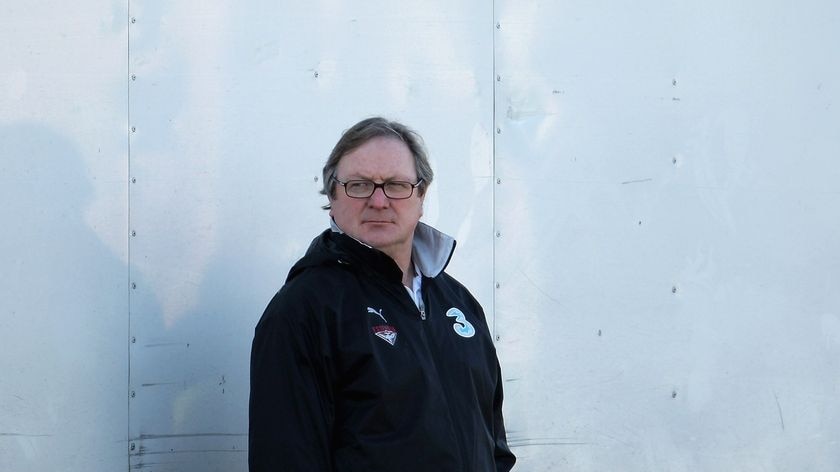 Kevin Sheedy watches a VFL clash`