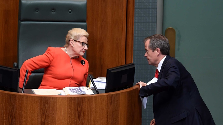 Opposition leader Bill Shorten (right) liaises with Speaker Bronwyn Bishop during Question Time