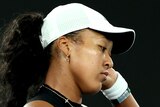 Naomi Osaka reflects during her first-round match at the Australian Open.