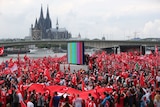 Supporters of Turkish President Recep Tayyip Erdogan attend a rally in Cologne.