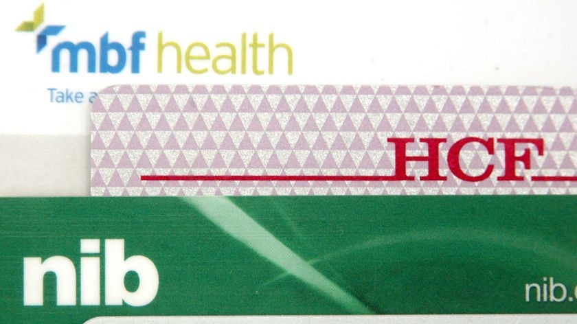 Health fund cards sit on a table