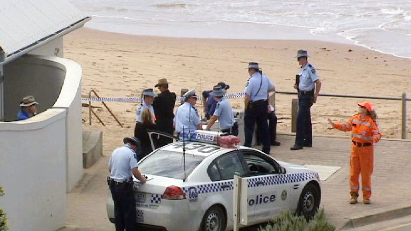 Police at a beach.