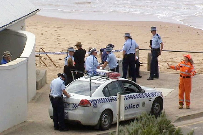 Police at a beach.