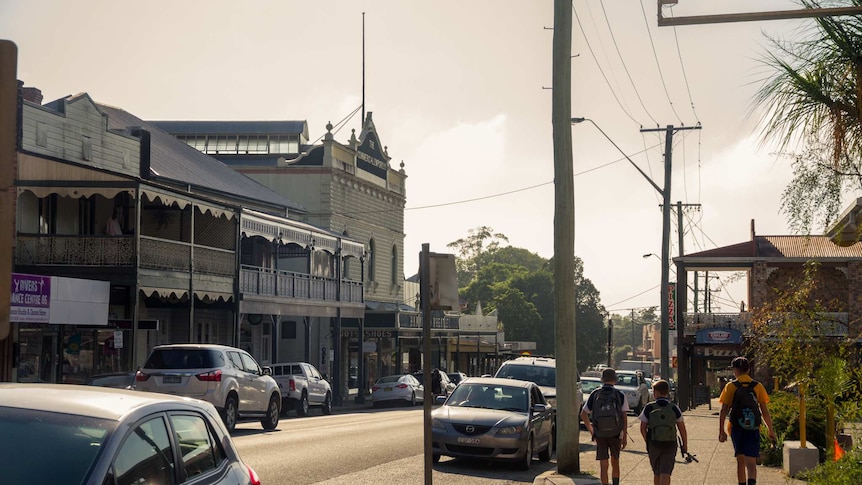 Looking down the Bellingen main street at building with heritage facades, in February 2018.