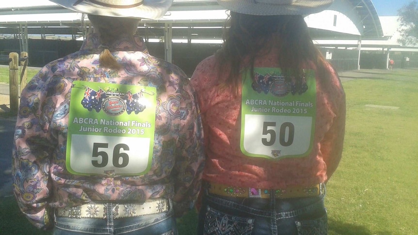 Twins sisters Janine and Mickalea Mongoo sporting their competition numbers for Australia's largest rodeo in Tamworth.