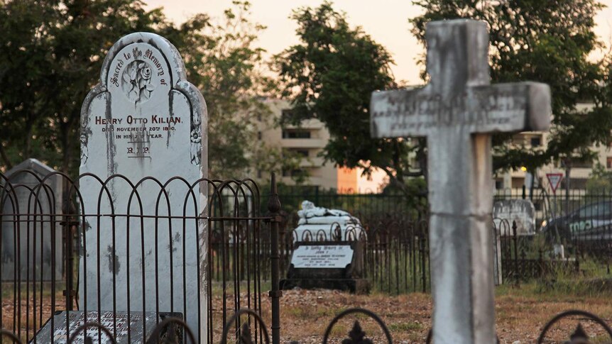 A photo of two burial headstones in the Pioneer Cemetery.