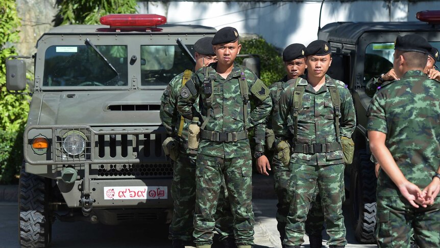 Thai soldiers stand guard outside parliament in Bangkok