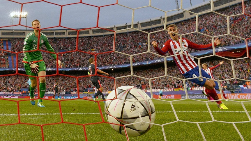 Antoine Griezmann celebrates Saul Niguez's goal against Bayern