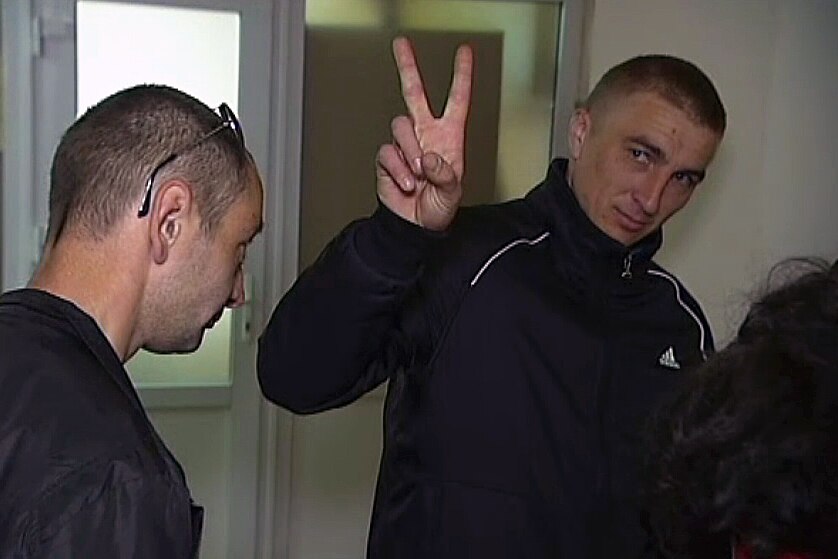 A Ukrainian army recruit gives the victory sign at a recruitment office in Kiev.