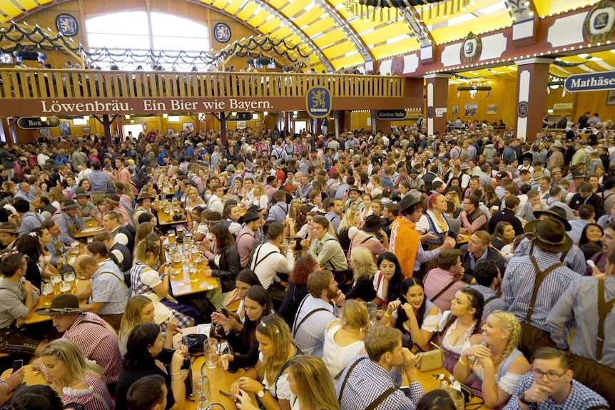A crowded beer hall for Oktoberfest in Munich.