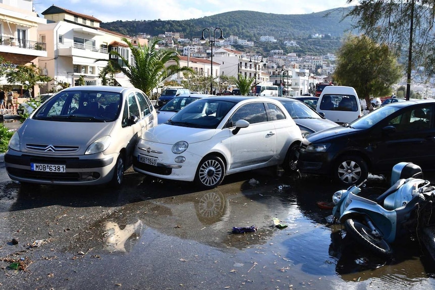 Cars are piled after an earthquake at the port of Vathi on the eastern Aegean island of Samos.
