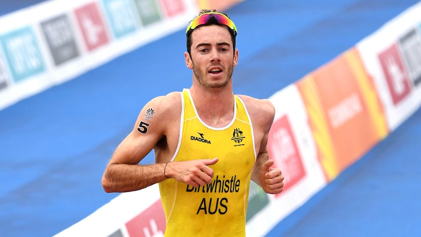 Jacob Birtwhistle of Australia crosses the finish line to win the silver medal.