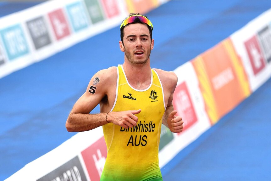 Jacob Birtwhistle of Australia crosses the finish line to win the silver medal.