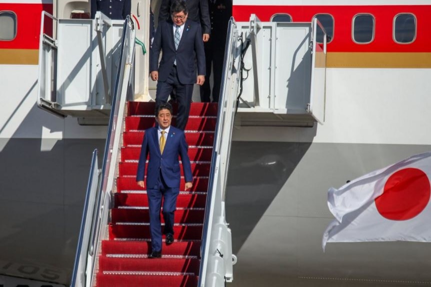 Japanese Prime Minister Shinzo Abe steps off a plane in Washington DC.