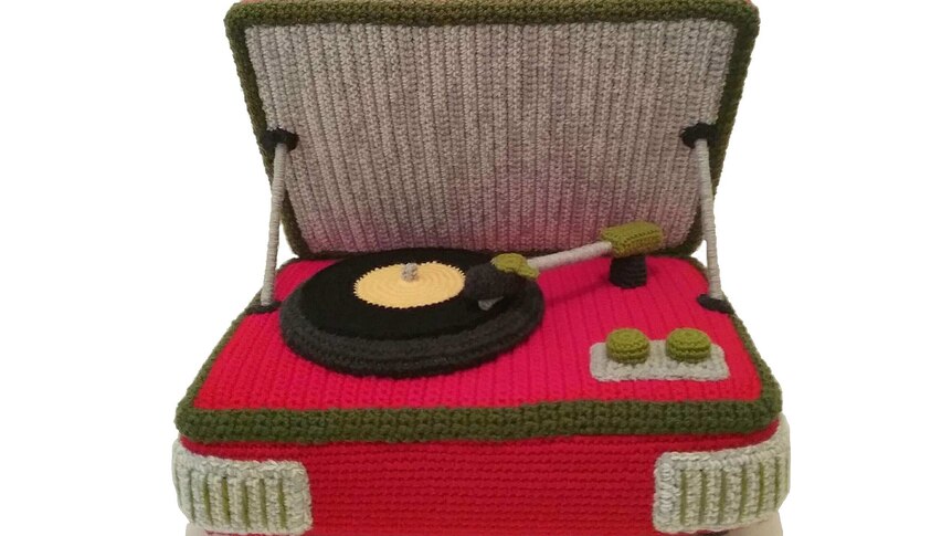 A crocheted red record player.