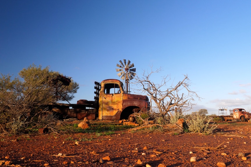 An old rusting truck at the entrance to Thundelarra station, July 2021.