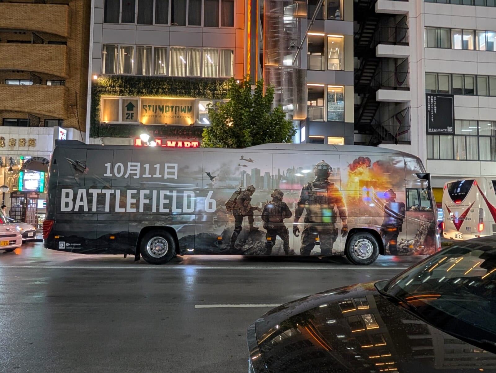 A bus with a large Battlefield image painted on the side.