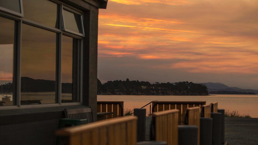 Sunset on hotel porch.