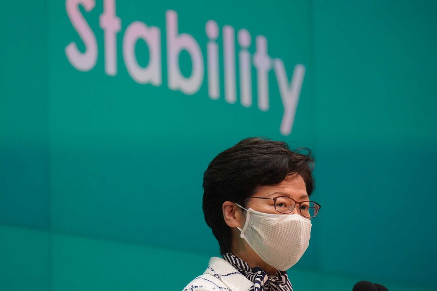 Hong Kong Chief Executive Carrie Lam listens to reporters questions during a press conference.