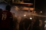 Police pepper spray a Darwin crowd on Mitchell Street