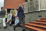 Bob Brown enters court in Hobart