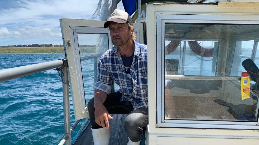 Mussel producer Michael Harris on his boat in Western Port Bay