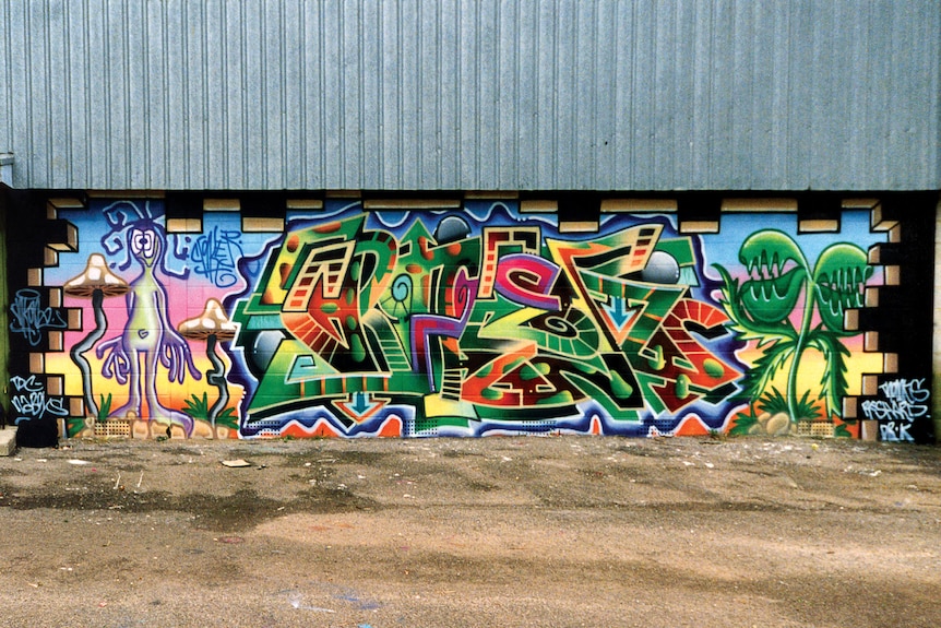 A colourful graffiti piece on a wall