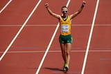 Jared Tallent crosses the line to win silver in the 50km walk at the world athletics titles