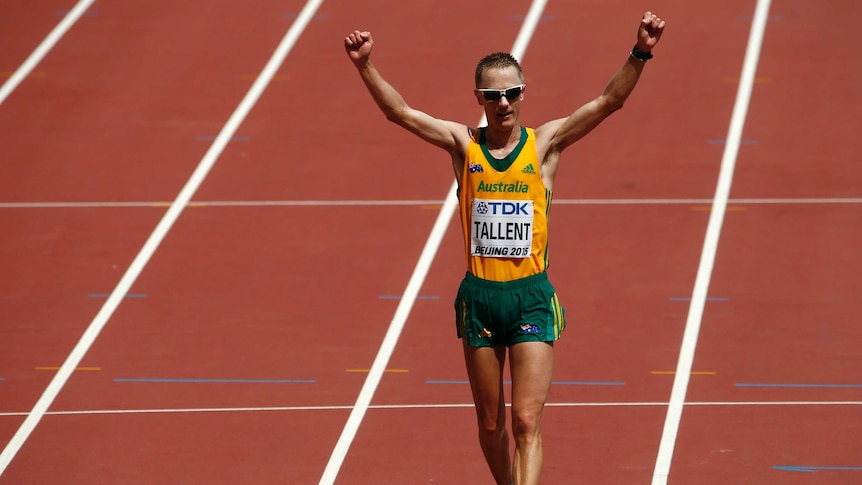 Australia's Jared Tallent crosses the line after finishing second in 50km walk at world titles.