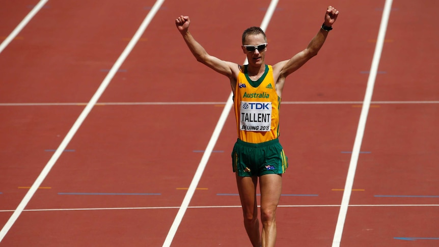 Jared Tallent crosses the line to win silver in the 50km walk at the world athletics titles