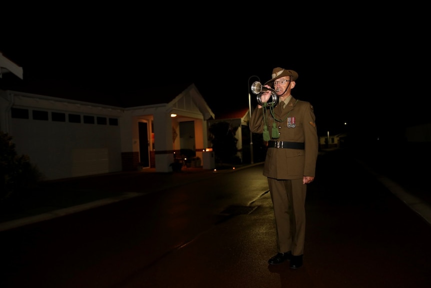 Retired Lance Corporal David Scott plays the Last Post