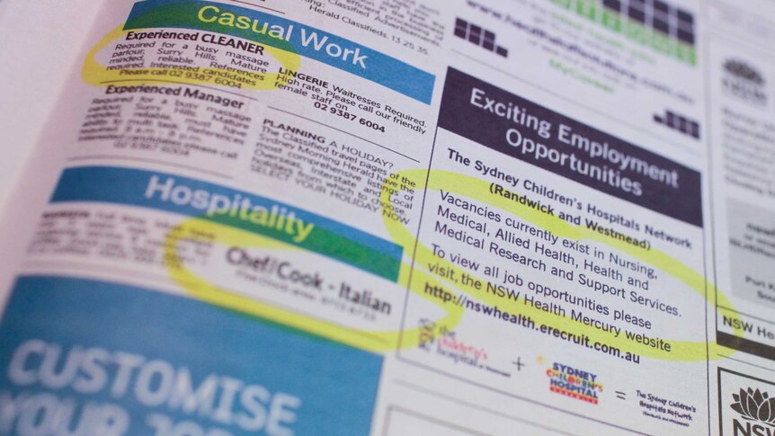 Job advertisements circled in a newspaper
