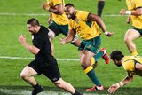 Dane Coles breaks away for the All Blacks against the Wallabies