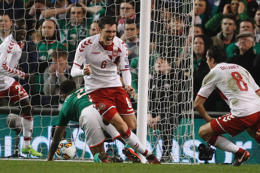 Denmark's Andreas Christensen (C) celebrates a goal against Ireland in their World Cup play-off.