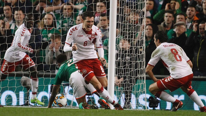 Denmark's Andreas Christensen (C) celebrates a goal against Ireland in their World Cup play-off.