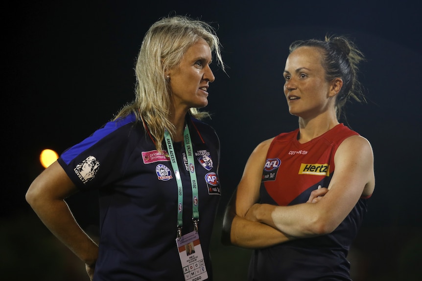 Debbie Lee and Daisy Pearce of the Demons are seen after the 2020 AFLW Round 2 match.