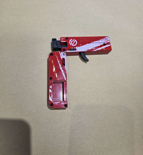 SA Police charge man over alleged possession of mobile phone gun
