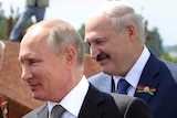 Russian President Vladimir Putin and Belarusian President Alexander Lukashenko side beside each other.